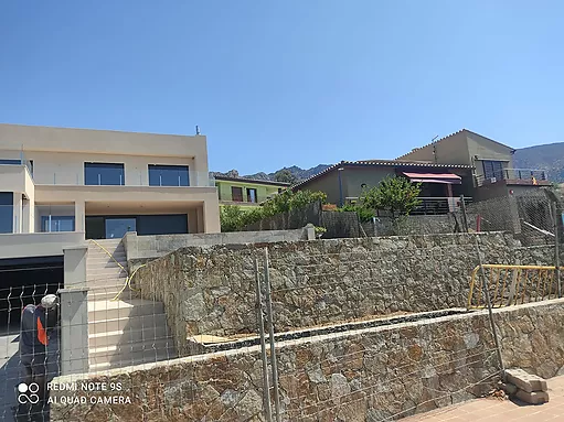 For sale in Palau Saverdera new construction house with modern design and stunning views.